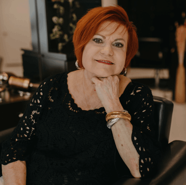 Cindy Lopossay sitting in salon studio